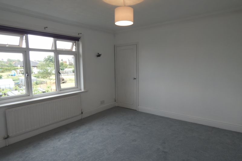 Bedroom One- click for photo gallery